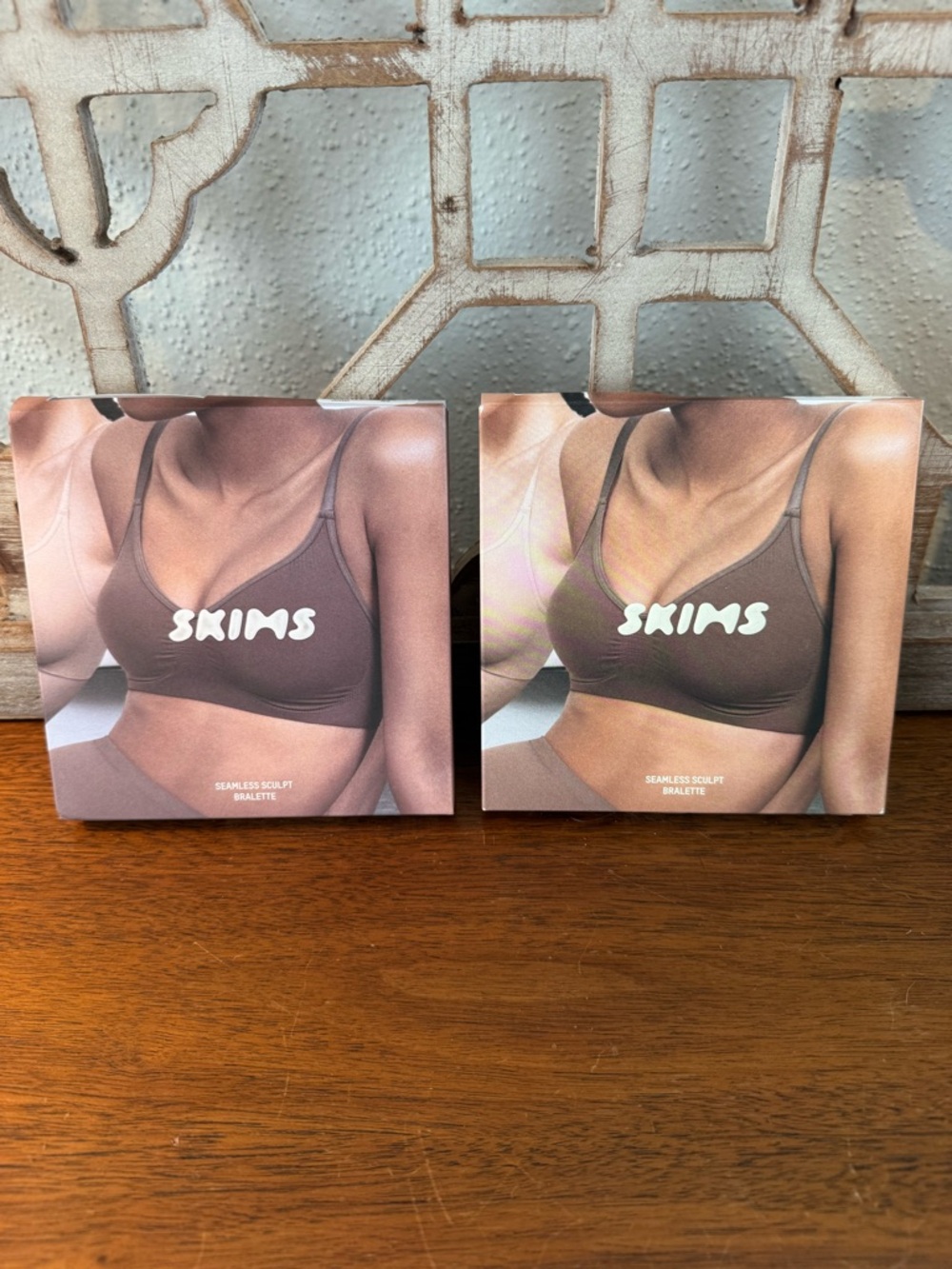 Pair of SKIMS Seamless Sculpt Bralette - Sand and Onyx